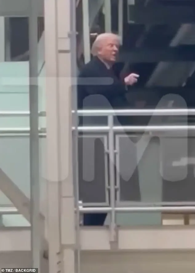 Heckler's Epstein Accusation Sparks Controversy During Trump's Michigan Visit