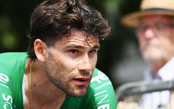 Giro d'Italia bans Enrico Zanoncello for helmet strike on rival.